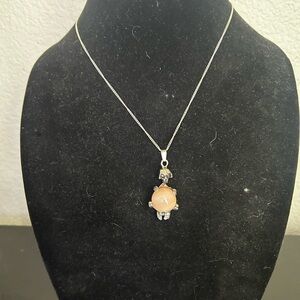 Elegant Crystal and Skeleton Pendant Necklace